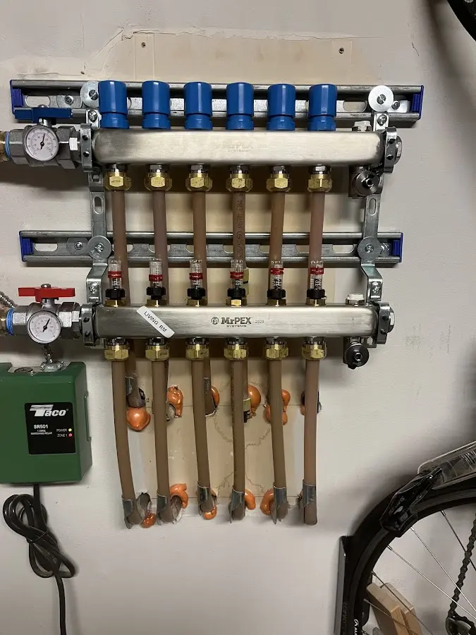 Plumber performing Water Heater Repair at a residential property in St. Robert